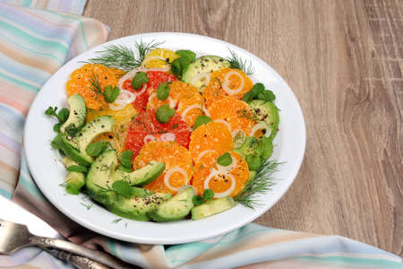 Salad citrus fennel and avocado with shallots and mint leaves