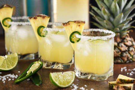 Alcoholic cocktail Pineapple Margarita, tequila with lime and jalapenoの写真素材