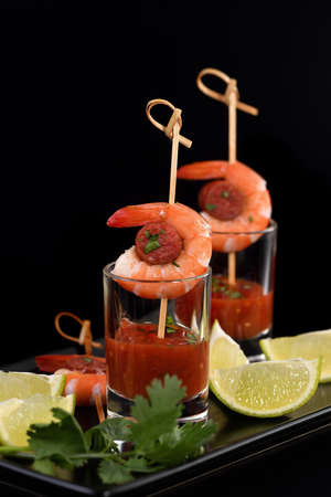 Appetizer of shish kebab with shrimps and chorizo â€‹â€‹sausages with ...