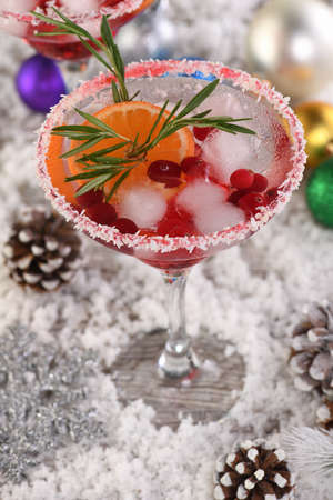 Christmas Cranberry margarita cocktail is mandarin and rosemary combined with cranberries and tequila. This cocktail is bursting with vibrant citrus and herb aromas, showcasing the best winter season fruits.Festive Christmas or New Year drinkの写真素材