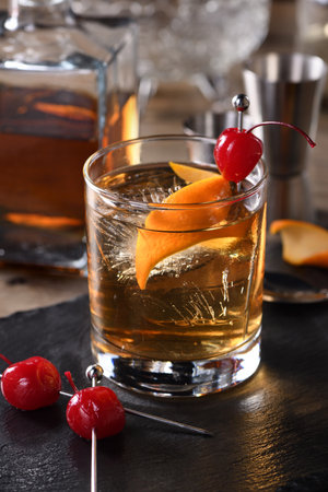 Cocktail Old Fashioned is an old-fashioned sophistication of whiskey and sweet syrup. Served with...