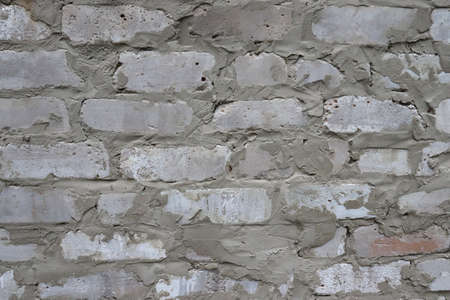 Abstract old cracked white wall texture. Crack building surfaceの写真素材