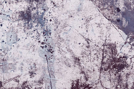 Old cracked cement wall with colorful paint. Concrete slab background