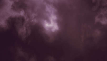 Danger weather wallpaper. Dramatic dark clouds background. Storm cloud in skyの写真素材