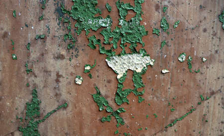Vintage texture with old cracked paint on rusted metal surface