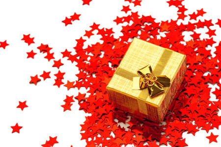 Small box is standing on scattered ornamental starの写真素材