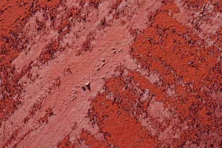 The old walls are covered with crumbling paintの写真素材