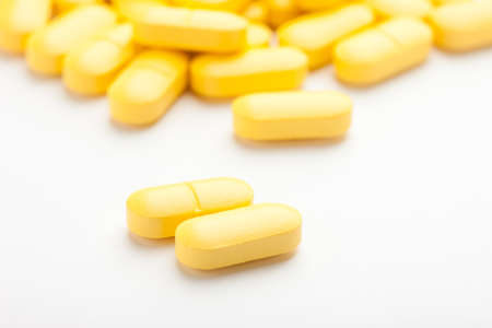 Medicinal pills piled up a bunch of closeup