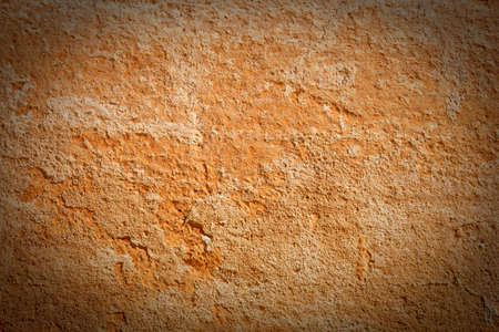 The old wall covered with plaster crashedの写真素材