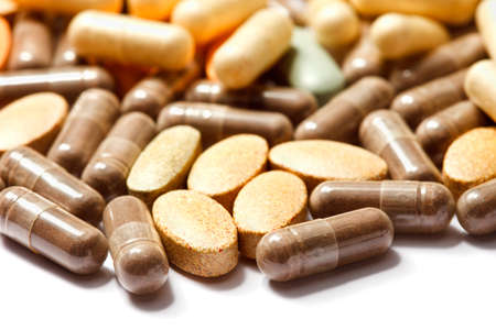 Medicinal pills piled up a bunch of closeup Medicinal pills piled up a bunch of closeup