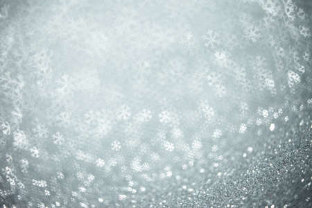Beautiful festive abstract background with many snowflakes