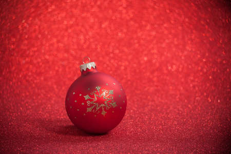 Christmas ball on a beautiful background with shallow depth of fieldの写真素材