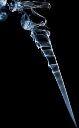 The abstract figure of the smoke on a black backgroundの写真素材