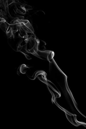 The abstract figure of the smoke on a black backgroundの写真素材