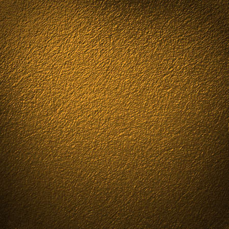 brown gold background old paper on vintage grunge background texture design of black edges, abstract scratch background for Christmas or anniversary, elegant background for wedding invitation or wallの写真素材