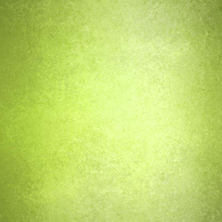 abstract green background with yellow center and soft pastel green vintage grunge background textureの写真素材