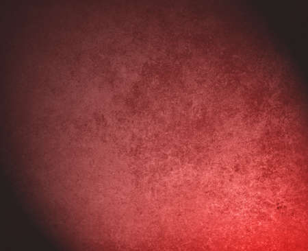 abstract red background pink faded stain colors with sponge vintage grunge background texture, distressed rough smeary paint on wall, art canvas or board for brochure ad or website templateの写真素材