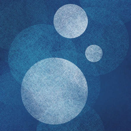 abstract modern background blue color with white parchment balls floating in random bokeh patternの写真素材
