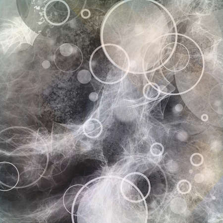 abstract black and white geometric background with circles, rings, wispy strings, balls, and white...