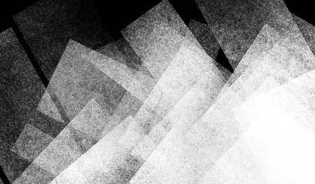 abstract black background with geometric design of white transparent square and rectangle shapes and diagonal lines in modern wallpaper pattern element with lots of textureの写真素材