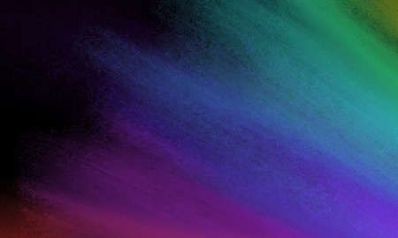 colorful streaks of purple blue green and red grunge on black background in an elegant splash of...