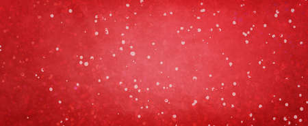 old vintage red paint spatter background that has distressed painted texture and soft darker border...