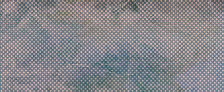 old blue gray polka dot background material with creased wrinkles and distressed faded texture grunge, retro circle patternの写真素材