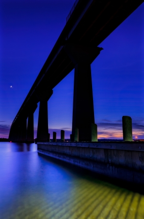 The Governor Thomas Johnson Bridge over the Patuxent River at twilight, Solomons Island, Marylandの写真素材