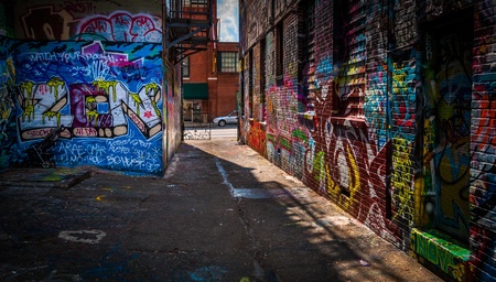 Looking toward Howard Street in the Graffiti Alley, Baltimore, Maryland.のeditorial素材