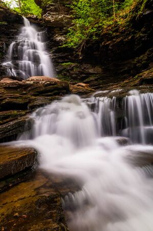 Tall waterfall and cascades on Kitchen Creek in Ricketts Glen State Park, Pennsylvania.