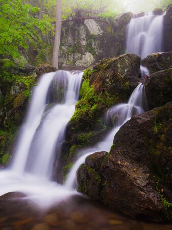 Side view of Upper Doyle's River Falls on a spring day in Shenandoah National Park, Virginia.の写真素材