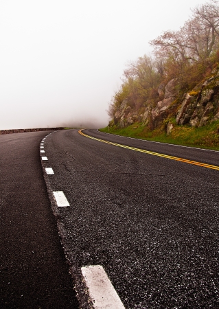 Skyline Drive disappears into fog, in Shenandoah National Park, Virginia.の写真素材