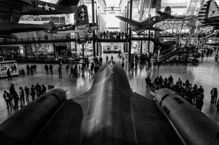 Tourists surround the SR-71 Blackbird in the Smithsonian Air and Space Museum Udvar-Hazy Center, in Chantilly, VA.のeditorial素材