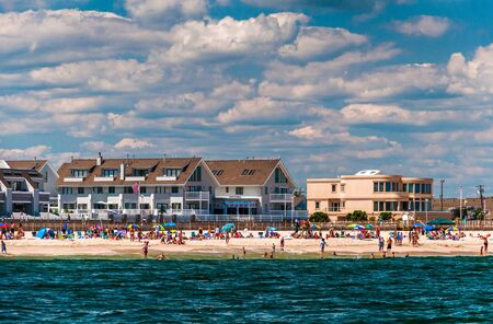 People and buildings on the beach in Point Pleasant Beach, New Jersey.のeditorial素材