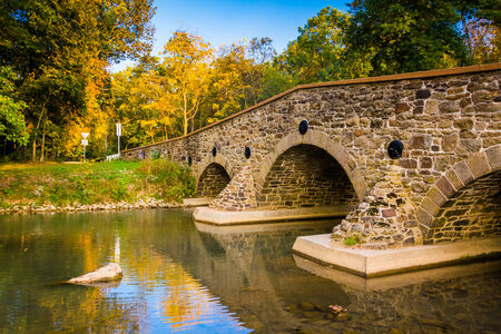 Stone bridge over a creek in Adams County, Pennsylvania.の写真素材