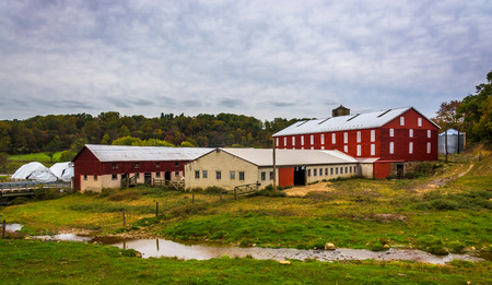 Barn and small stream on a farm in rural York County, Pennsylvania.のeditorial素材