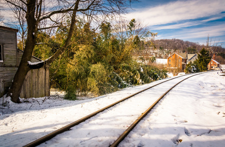 Snow covered railroad tracks in Lineboro, Maryland.の写真素材