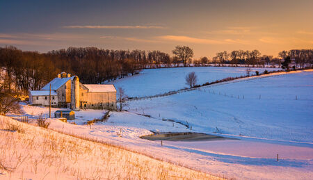 View of a barn on a snow-covered farm in rural York County, Pennsylvania.