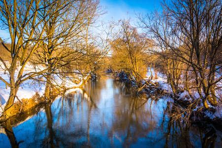 Winter view of a creek in rural York County, Pennsylvania.の写真素材