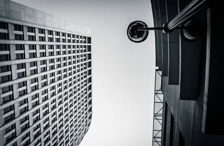 Looking up at a streetlamp and the Brandywine Building in downtown Wilmington, Delaware.の写真素材