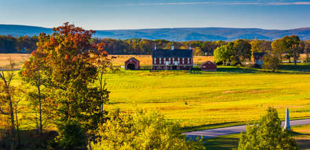 View of battlefields and a red barn in Gettysburg, Pennsylvania.の写真素材