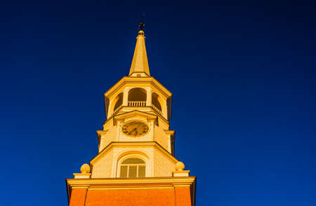 Evening light on the steeple of a church in York, Pennsylvania.の写真素材