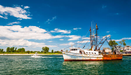 Old ship in Manasquan Inlet, in Point Pleasant Beach, New Jersey.のeditorial素材