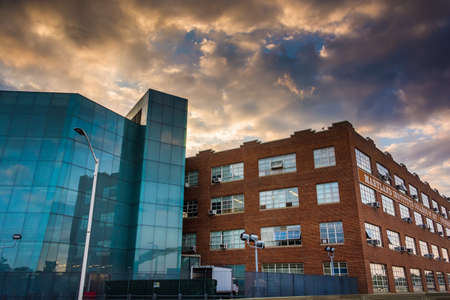 Sunset sky over buildings at the Maryland Institute College of Art in Baltimore, Maryland.のeditorial素材