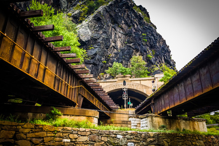 Train bridges and tunnel in Harper's Ferry, West Virginia.の写真素材