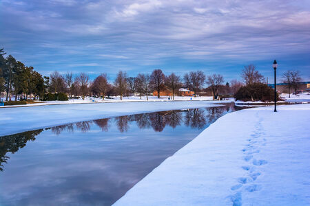 Winter reflections at Kiwanis Lake, in York, Pennsylvania.の写真素材