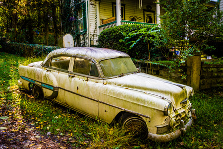 Old car in front of a house in Harpers Ferry, West Virginia.のeditorial素材