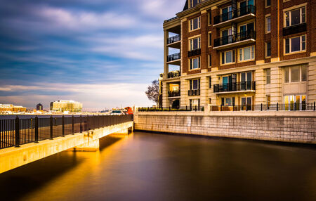 Long exposure of bridge and waterfront condominiums in the Inner Harbor, Baltimore, Maryland.の写真素材