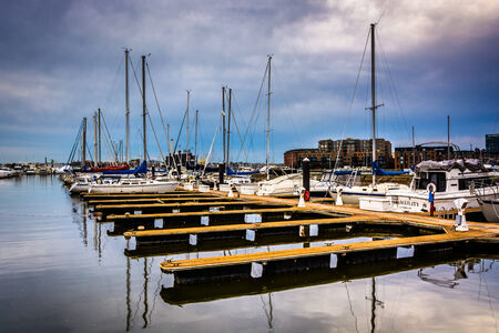Reflections at a marina in Canton, Baltimore, Maryland.のeditorial素材