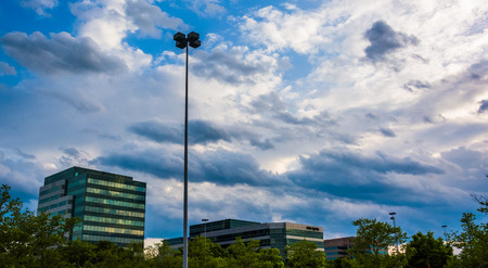 Interesting sky over highrises in Columbia, Maryland.の写真素材